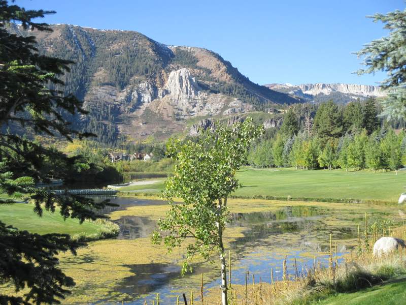 Real Estate in Mammoth Lakes: Creekhouse 5 photo of the 9th fairway and pond at snowcreek Golf course